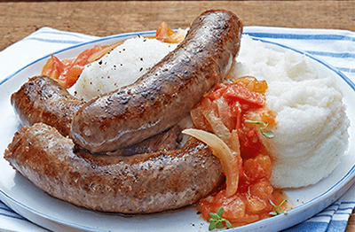 Must Cook winter food In South Africa pap wors with spicy tomato relish pap wors tomato